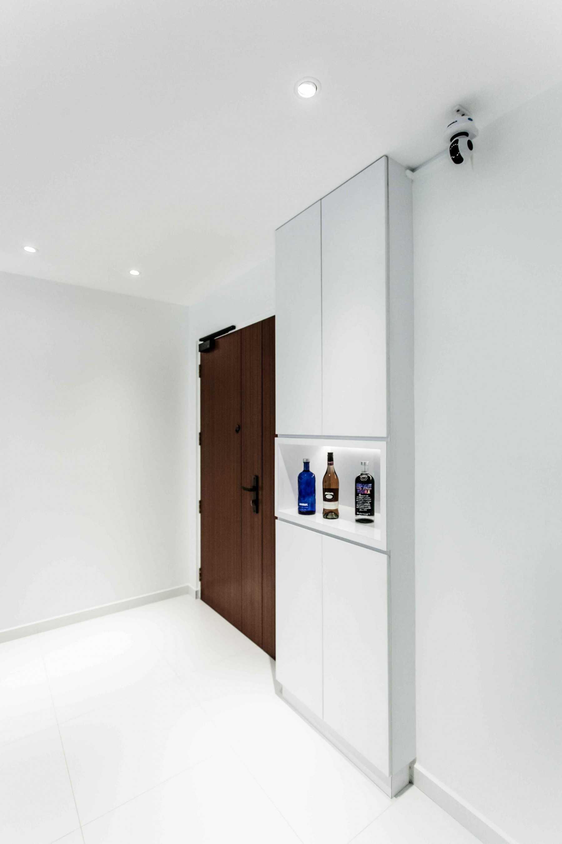 Modern Entryway with Downlights and Small Storage