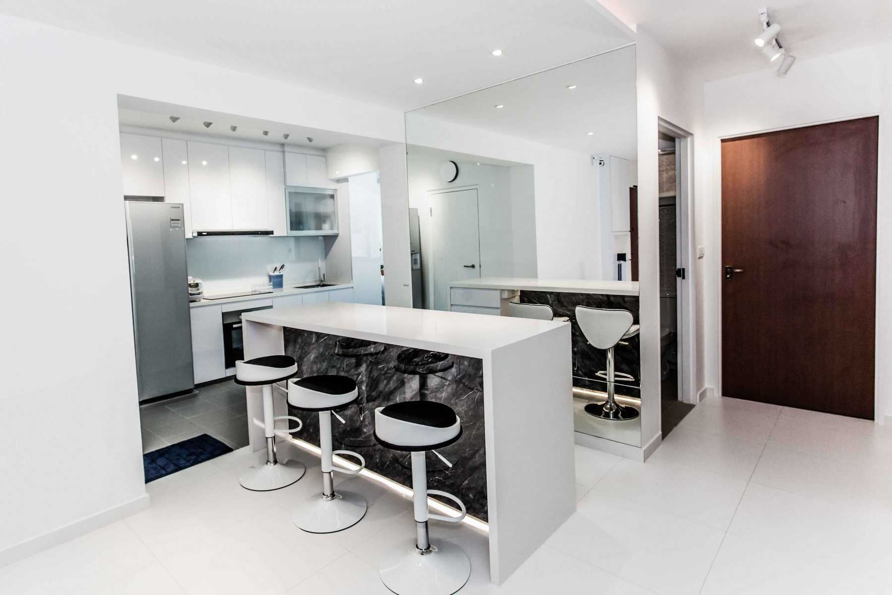 Modern Dining Room with Drop Light and Mirror