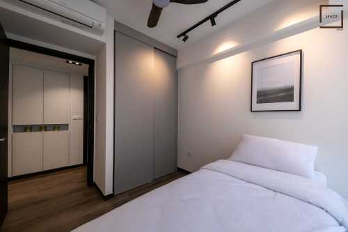 Contemporary Bedroom at LAKE GRANDE CONDO