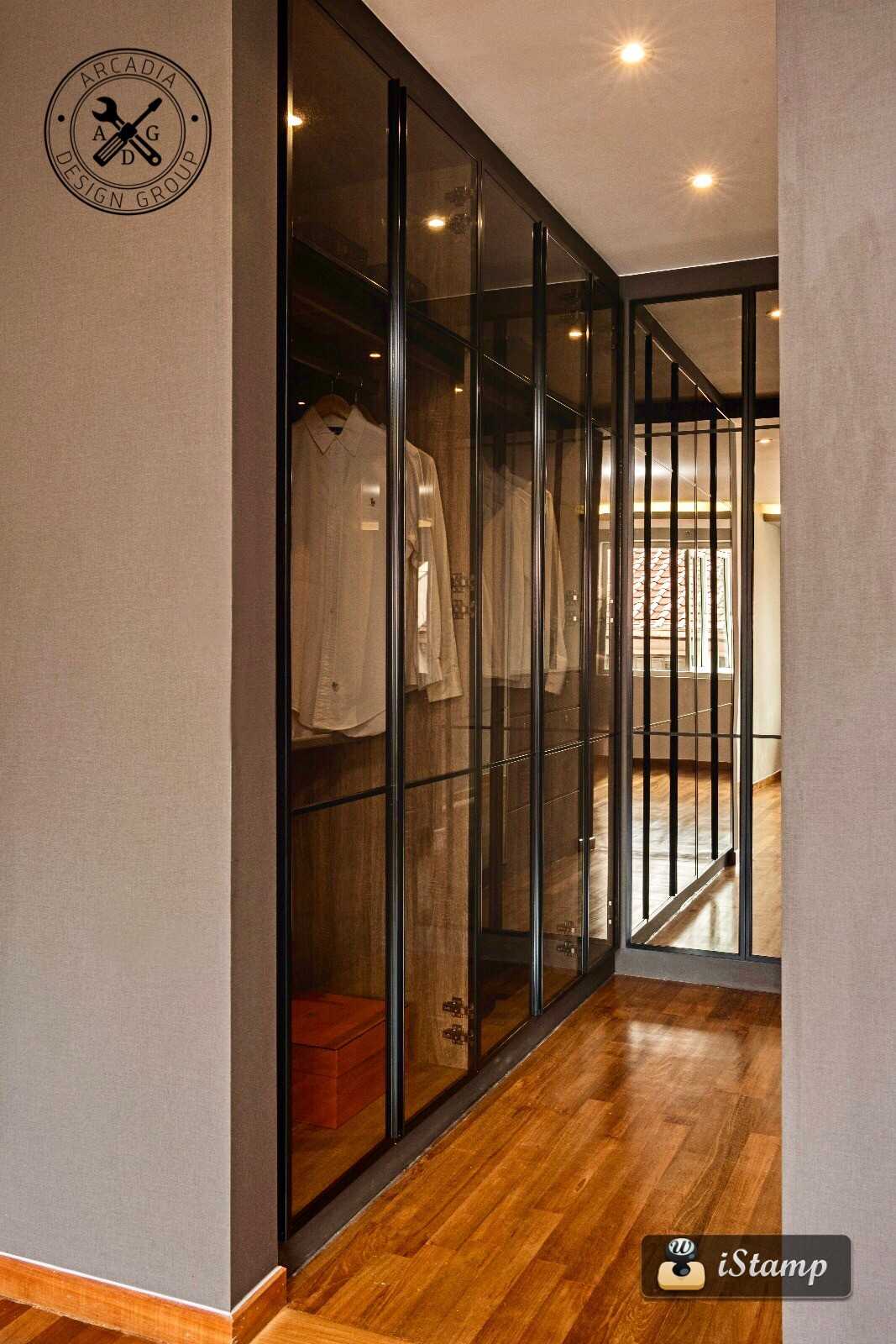 Contemporary Walk-in Wardrobe with Wood Flooring and Glass Door
