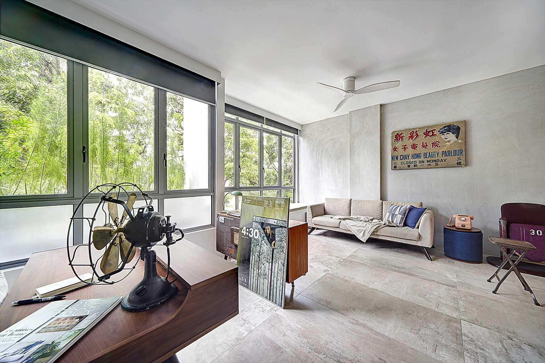 Vintage Living Room with Cement Floor and Sofa