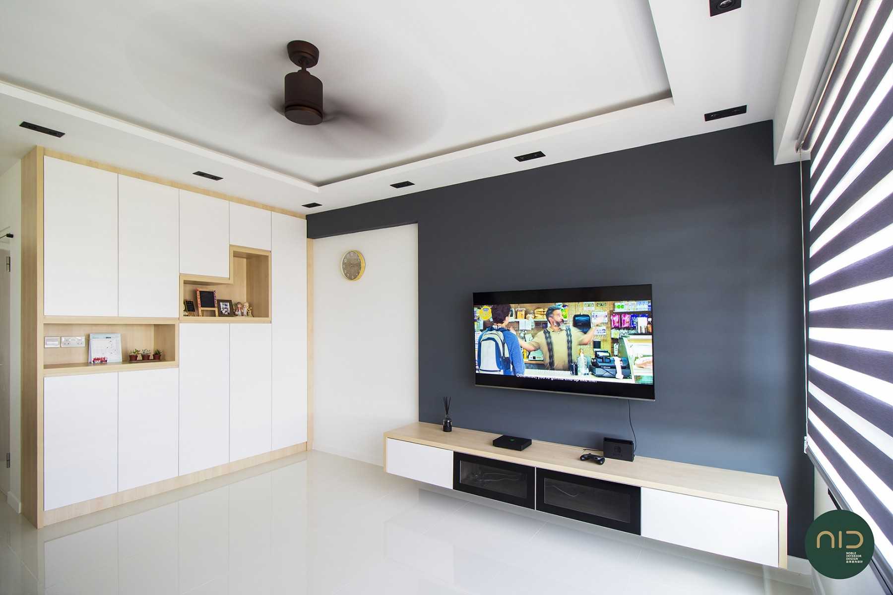 Scandinavian Living Room with Homogeneous Tiles and TV Console