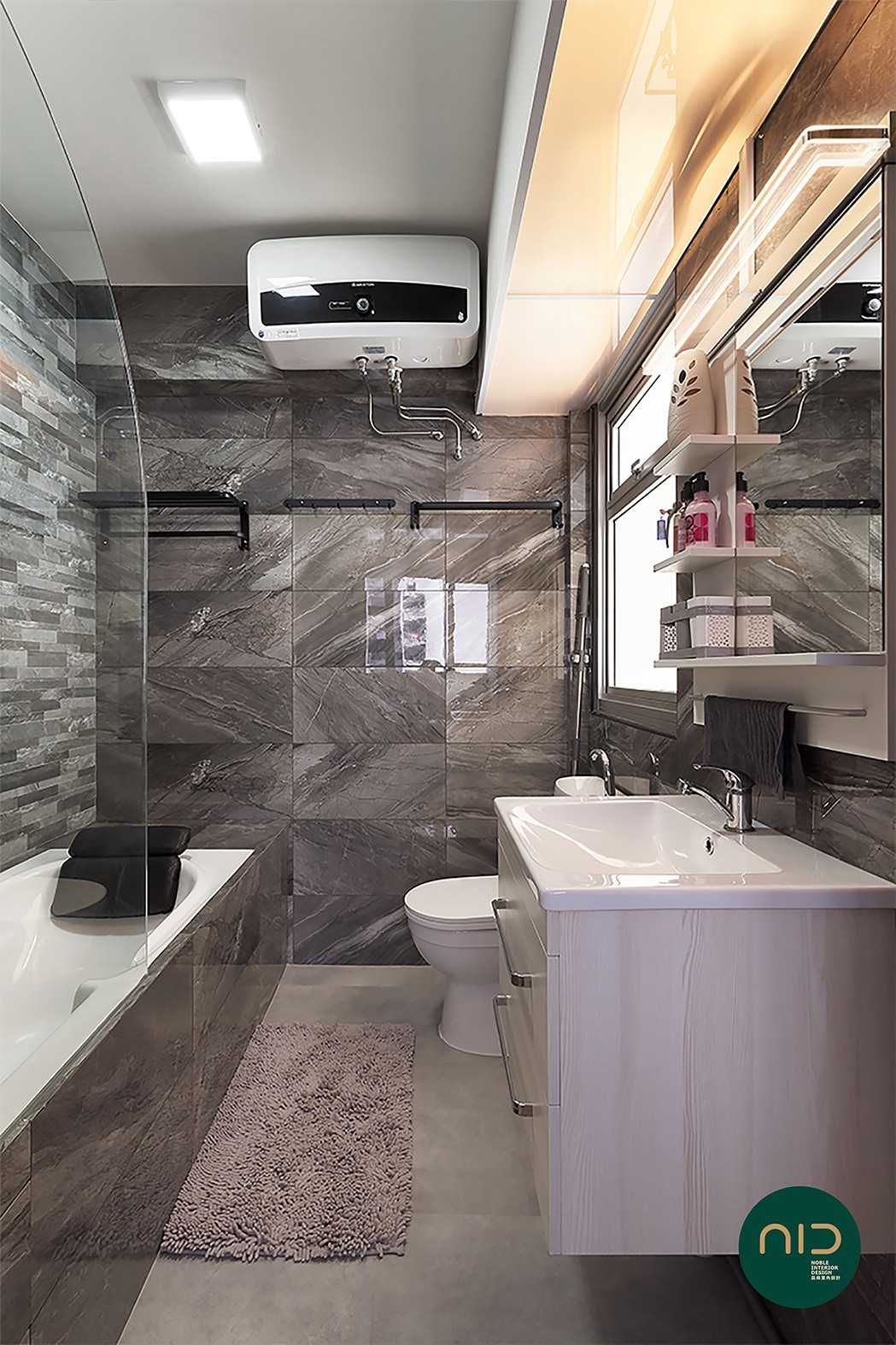 Modern Bathroom with Homogeneous Tiles and Mirror