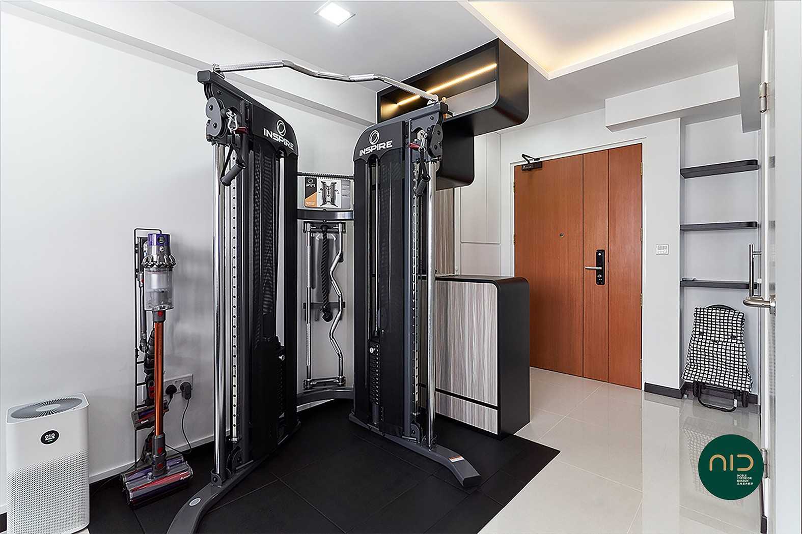 Modern Home Gym with Cove Lighting and Downlights