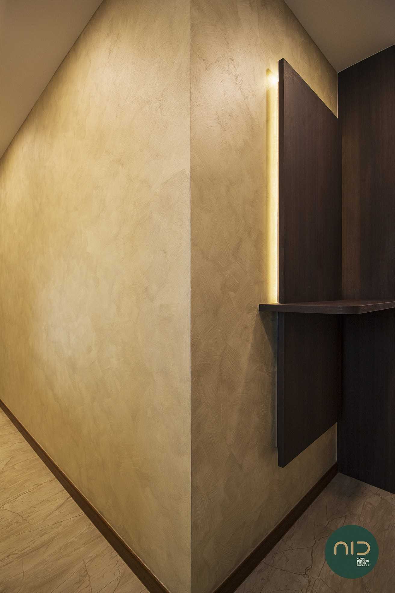 Modern Foyer with Feature Wall and Cove Lighting