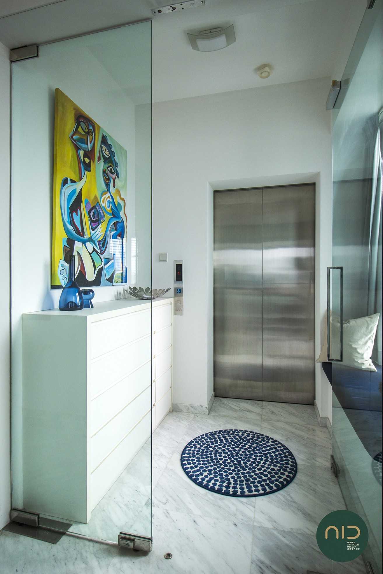 Modern Foyer with Bay Window and Glass Door