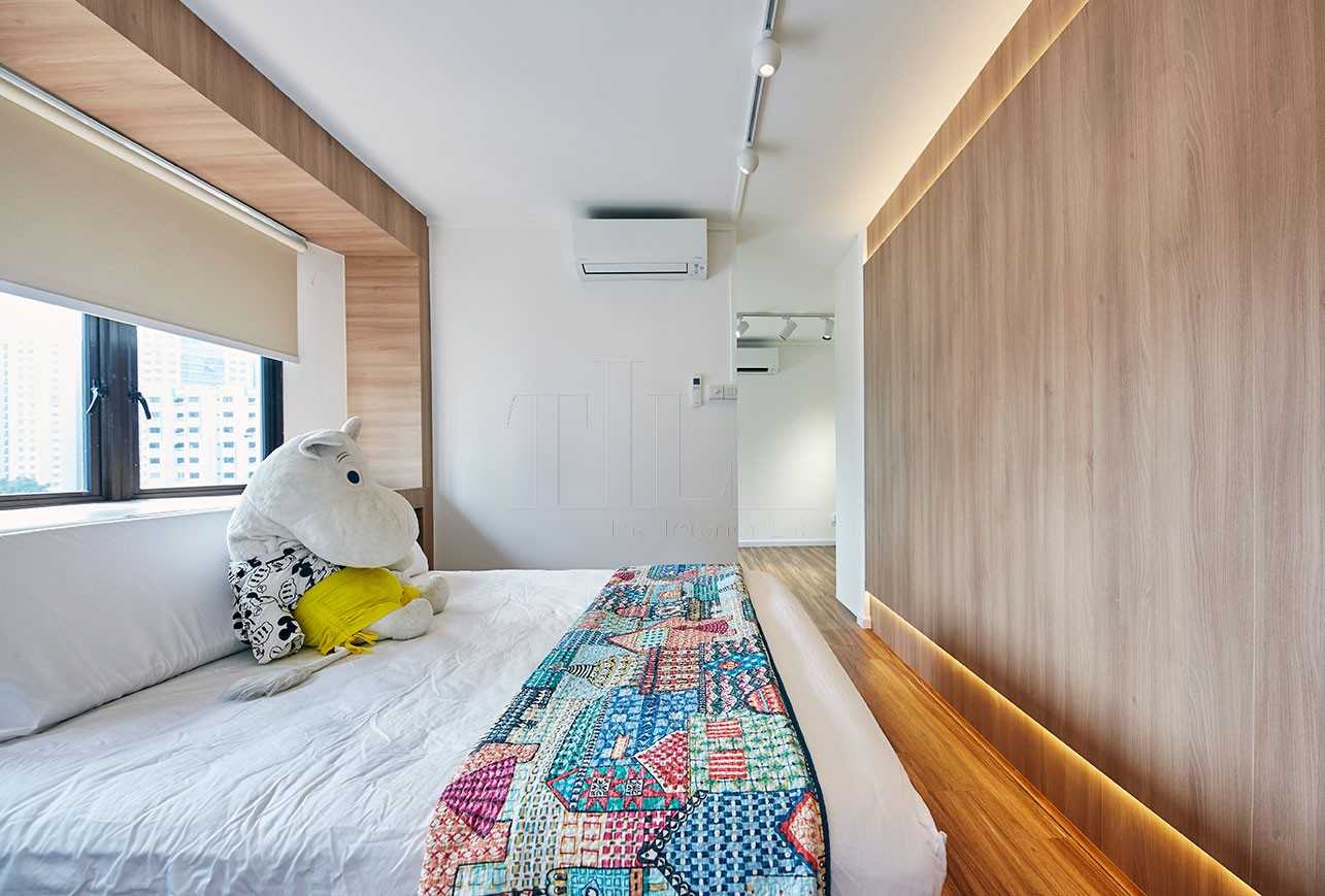 Scandinavian Bedroom with Wood Flooring and Feature Wall