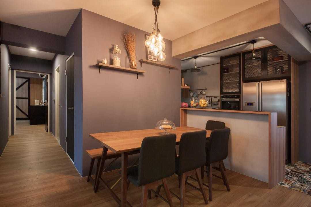 Eclectic Dining Room with Drop Light and Dining Table