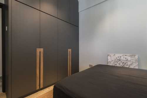 Contemporary Bedroom at H & M Apt