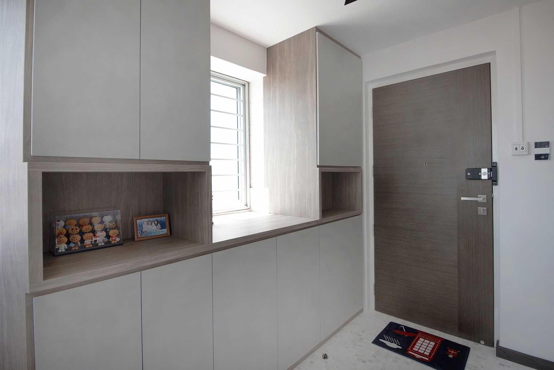 Contemporary Foyer with Window Grille and Storage Cabinets