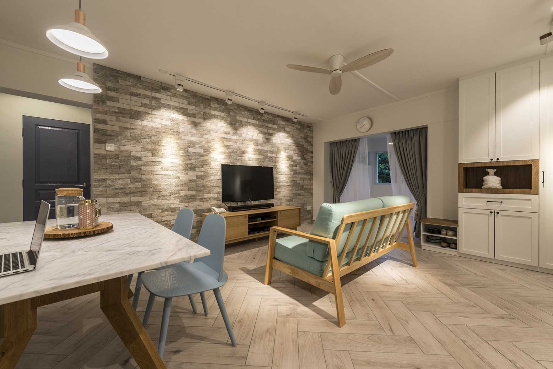 Country Living Room with Herringbone Tiling and TV Console