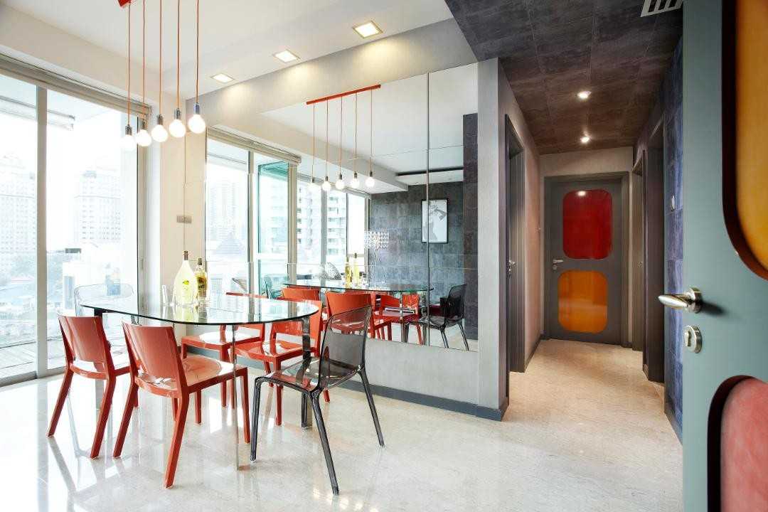Eclectic Dining Room with Drop Light and Mirror