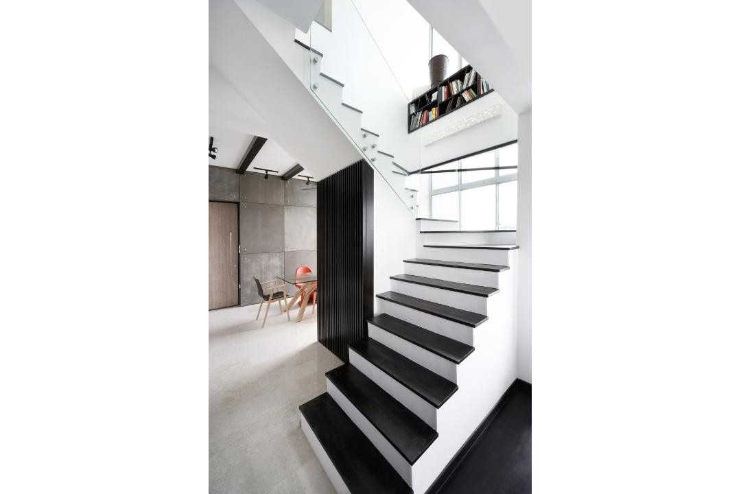 Eclectic Hallway with Bookshelf and Staircase