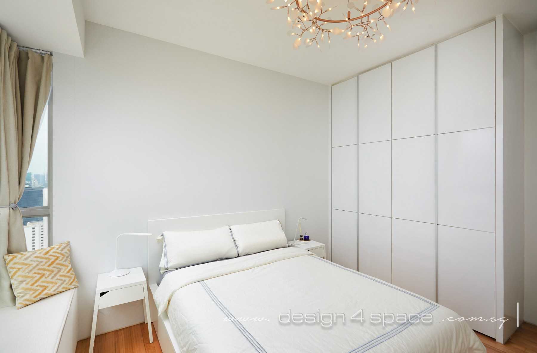 Minimalist Bedroom with Wood Flooring and Ceiling Light