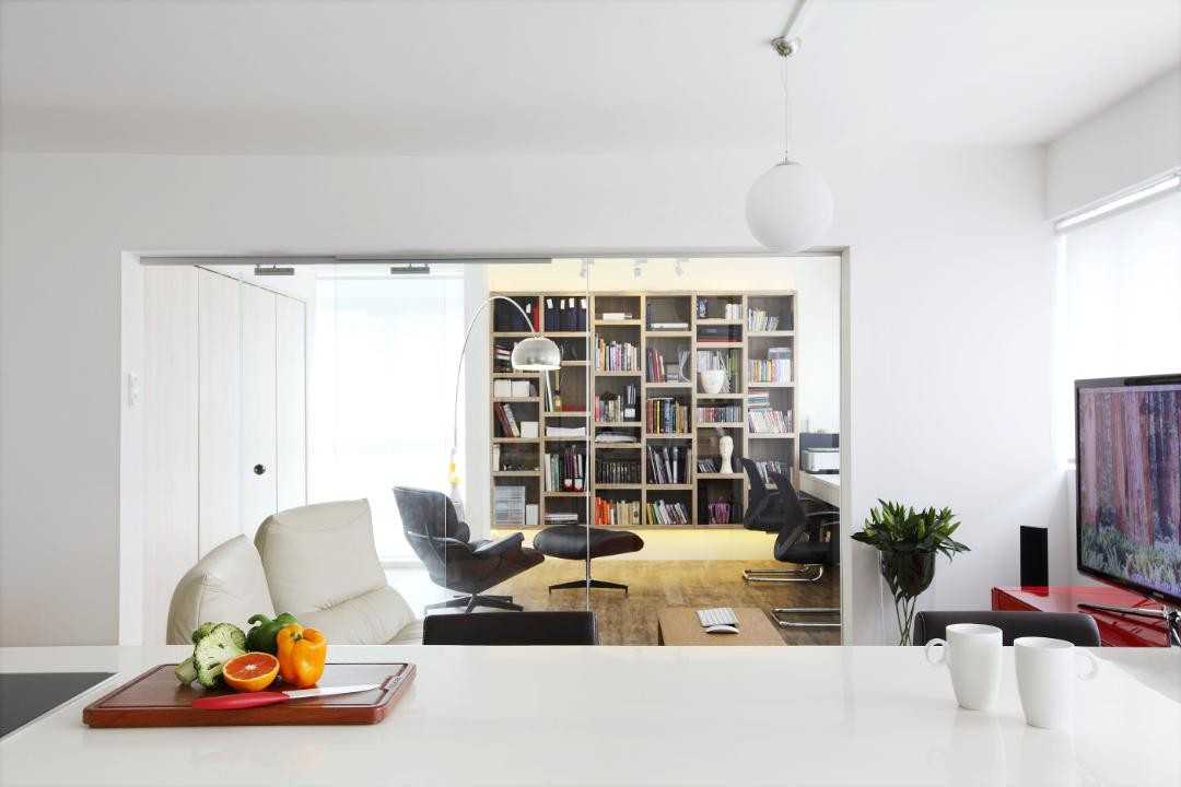 Modern Kitchen with Bar Counter and Bookcases