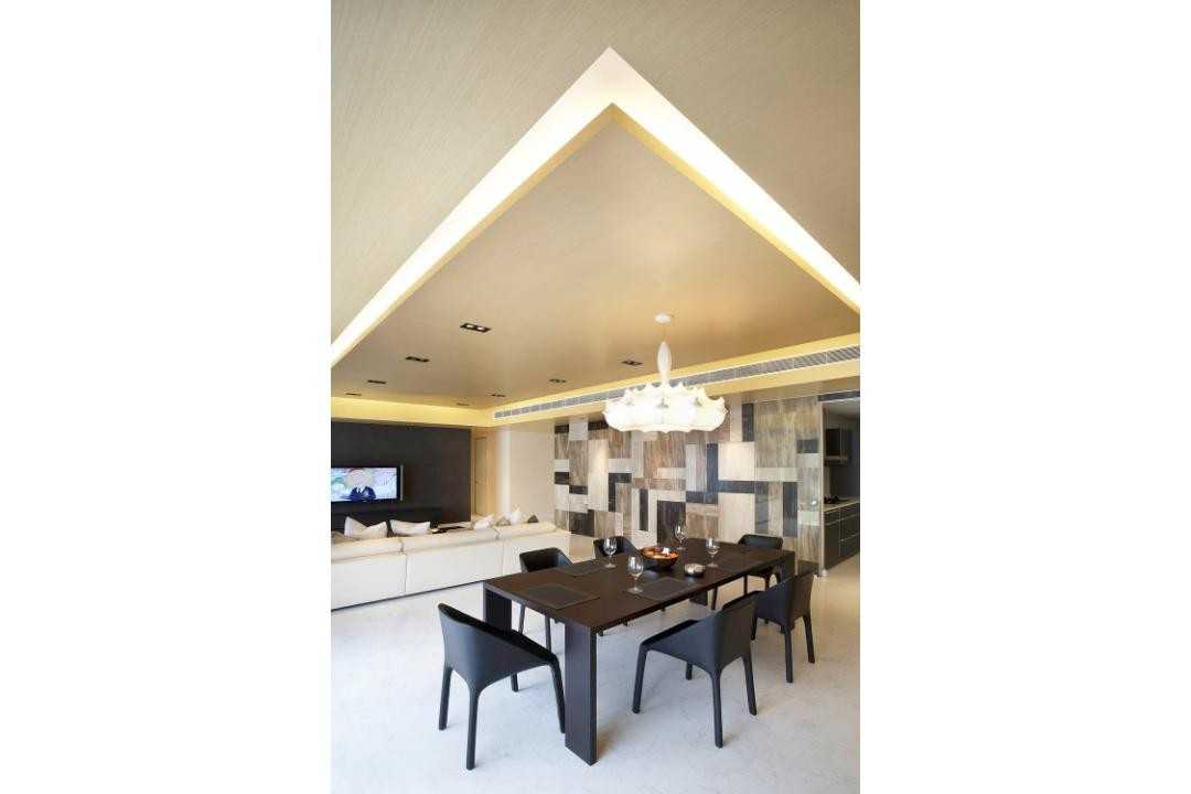 Modern Dining Room with Feature Wall and Cove Lighting