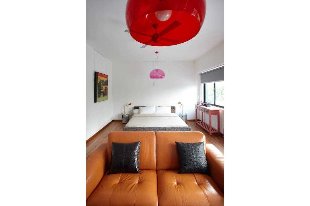 Eclectic Bedroom with Drop Light and Ceiling Light