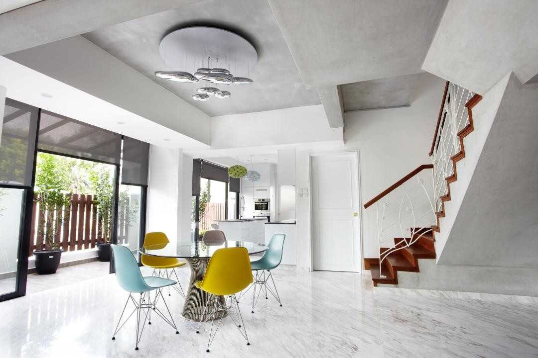 Eclectic Dining Room with Marble Floor and Staircase