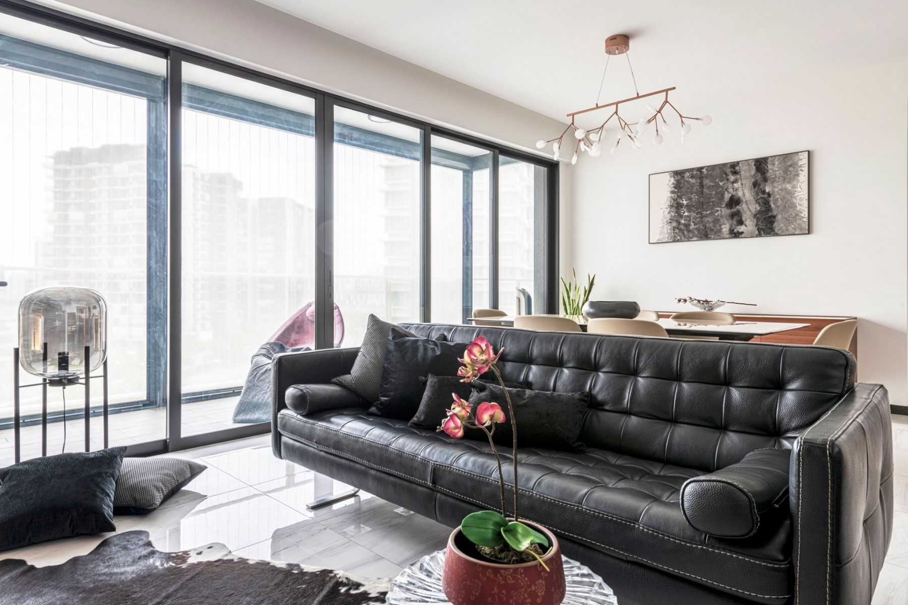 Contemporary Living Room with Feature Wall and Sofa