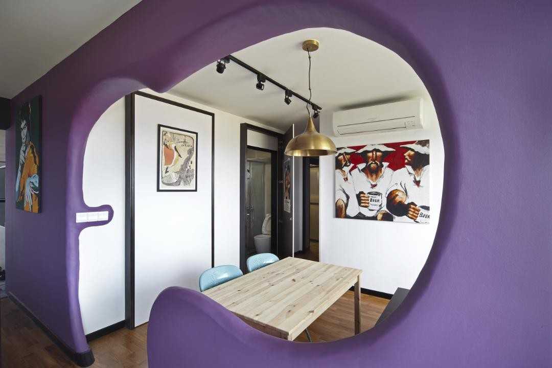 Eclectic Dining Room with Dining Table and Paintings