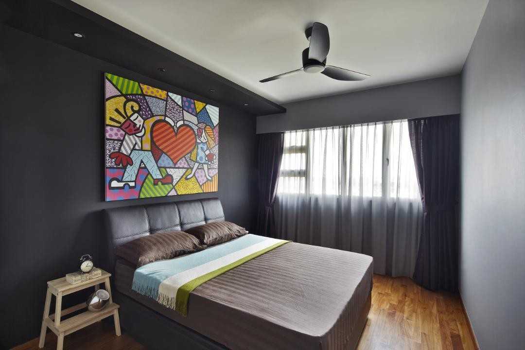 Eclectic Bedroom with Paintings and Stools