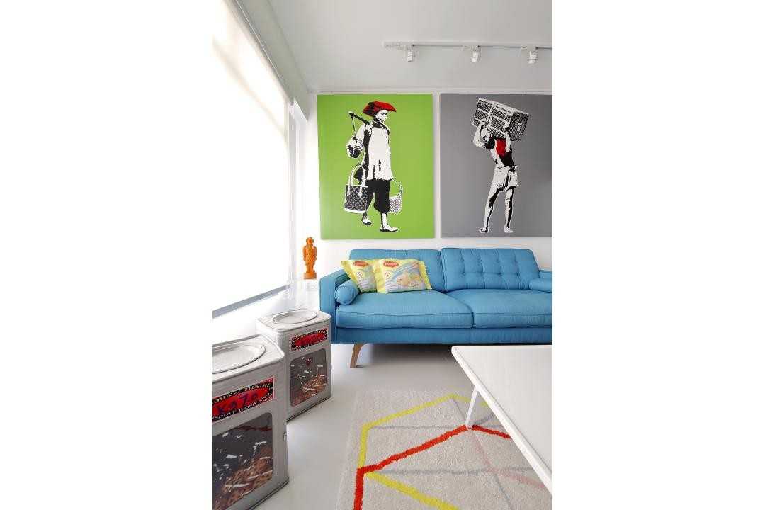 Transitional Living Room with Sofa and Paintings