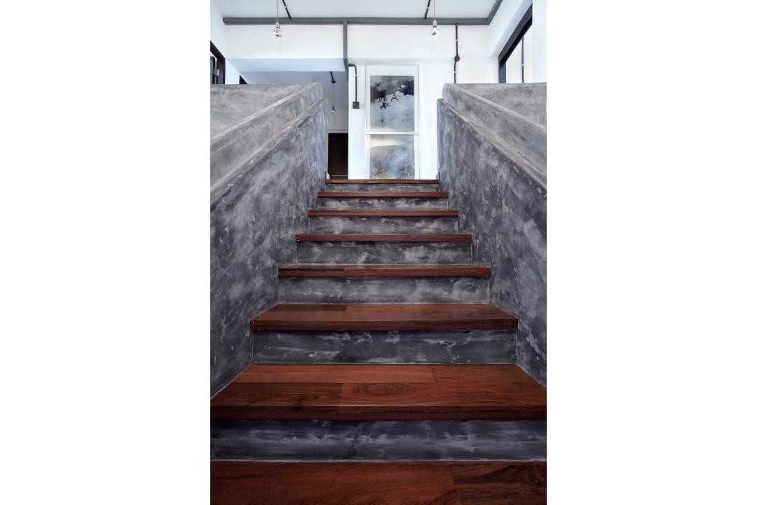 Industrial Hallway with Cement Floor and Wood Flooring