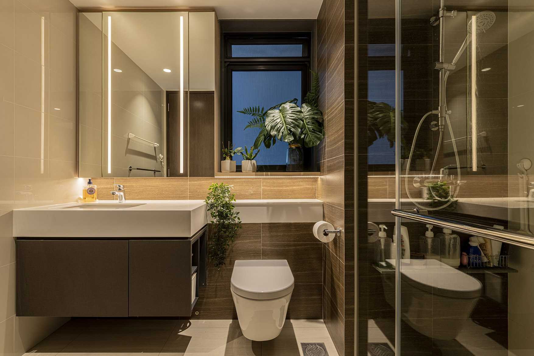Minimalist Bathroom with Shower Screen and Laundry Baskets
