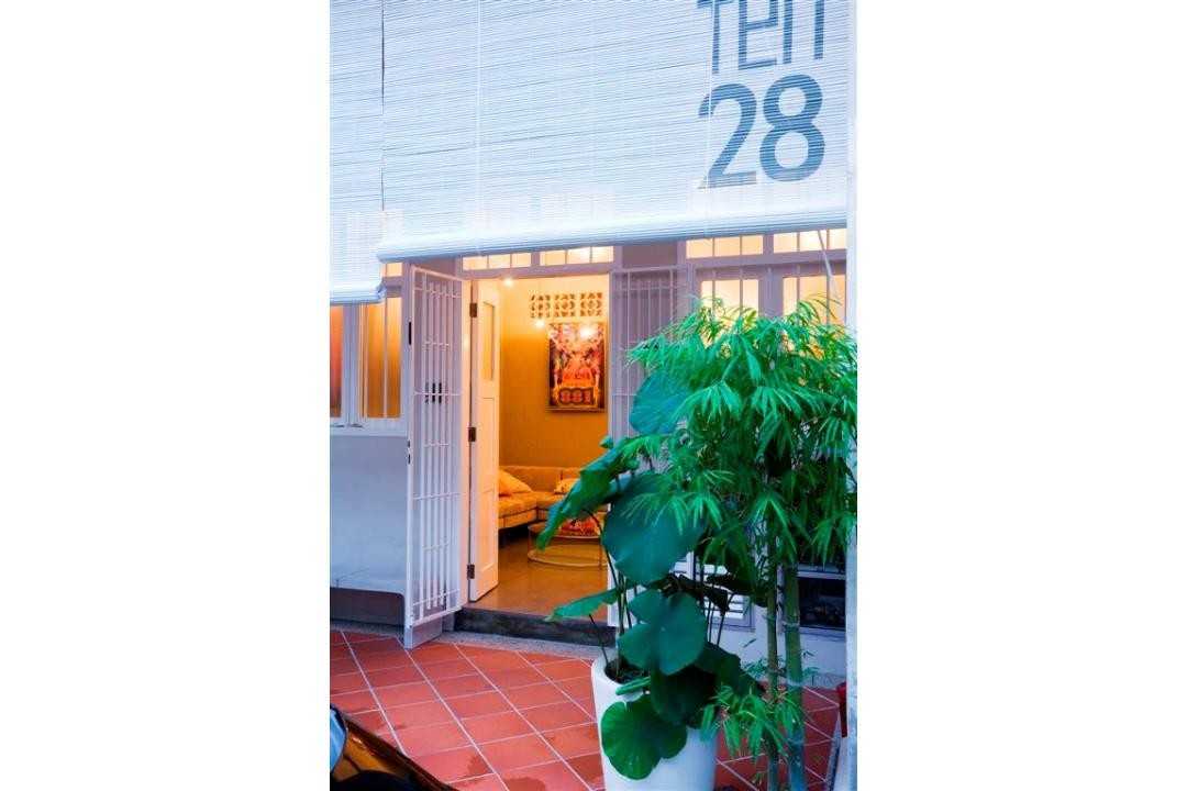 Eclectic Shopfront with Roller Blinds and Planters
