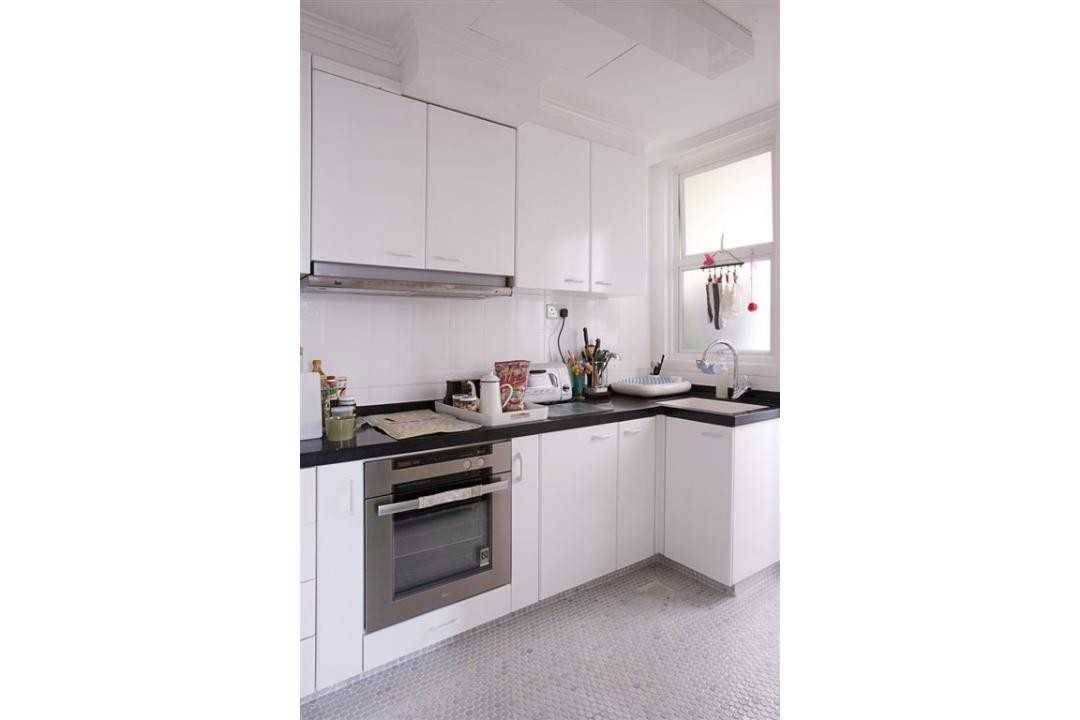 Eclectic Kitchen with Kitchen Cabinets and Oven
