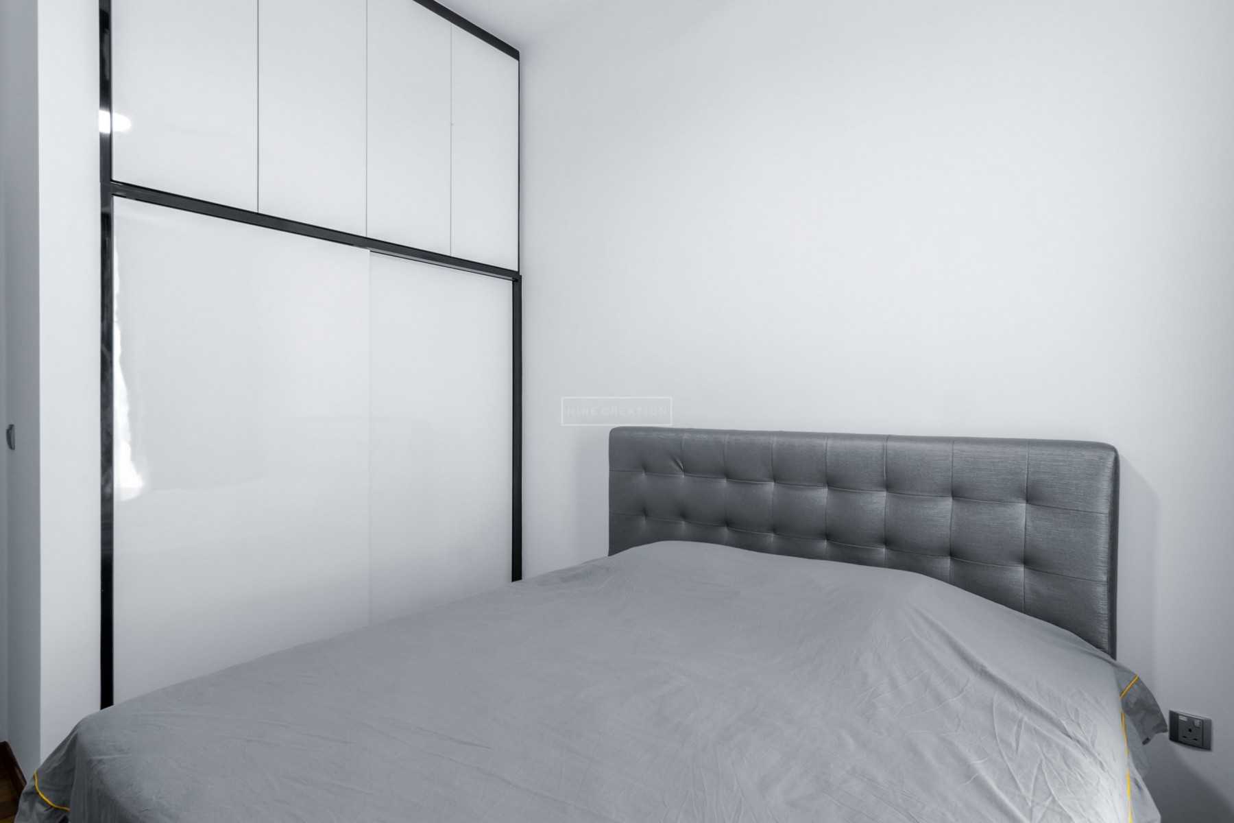 Contemporary Bedroom with Parquet Floor and Ceiling Light