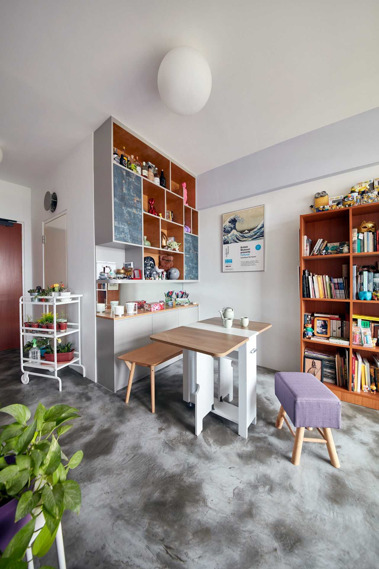 Eclectic Dining Room with Cement Floor and Dining Table