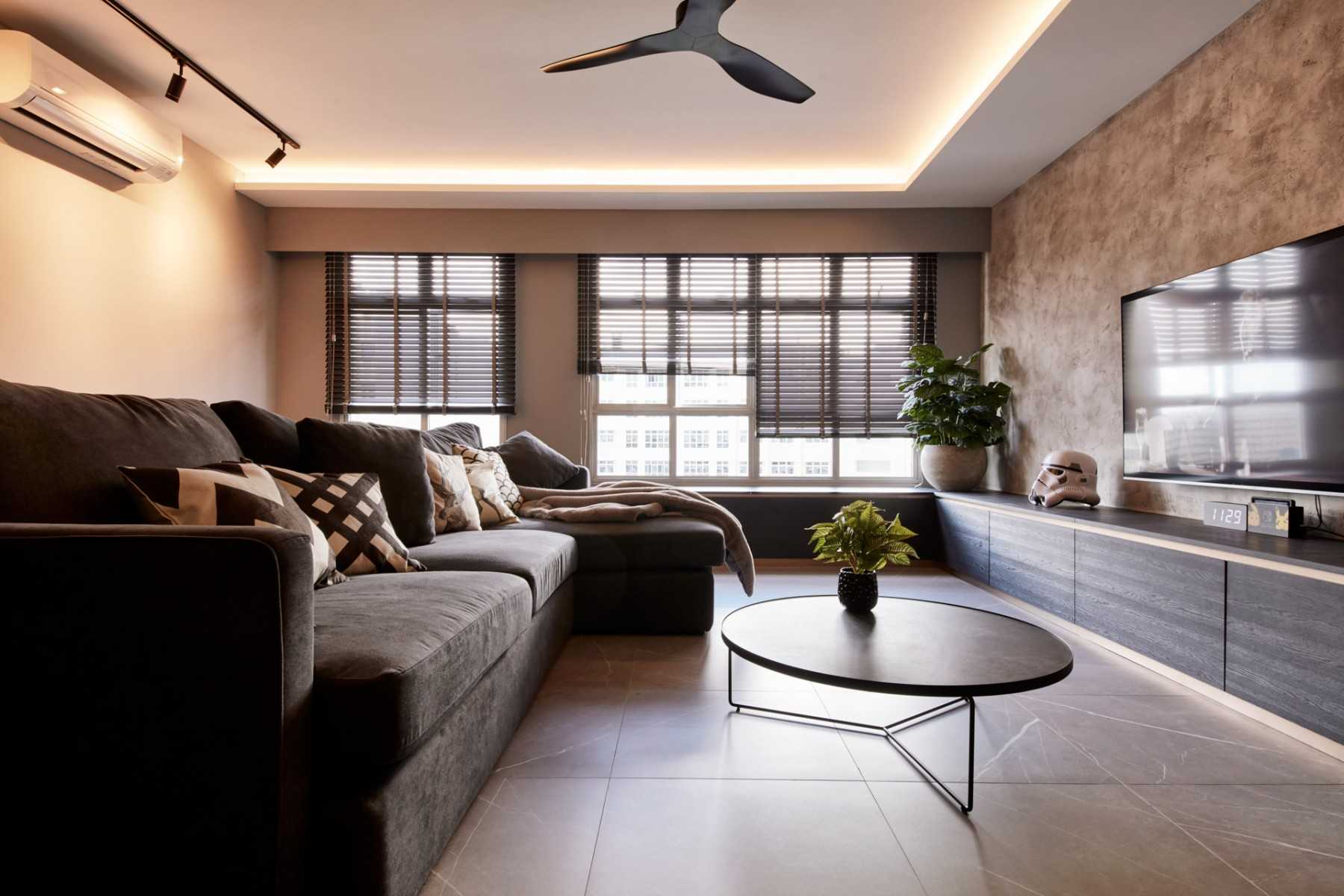 Modern Living Room with TV Console and Cove Lighting
