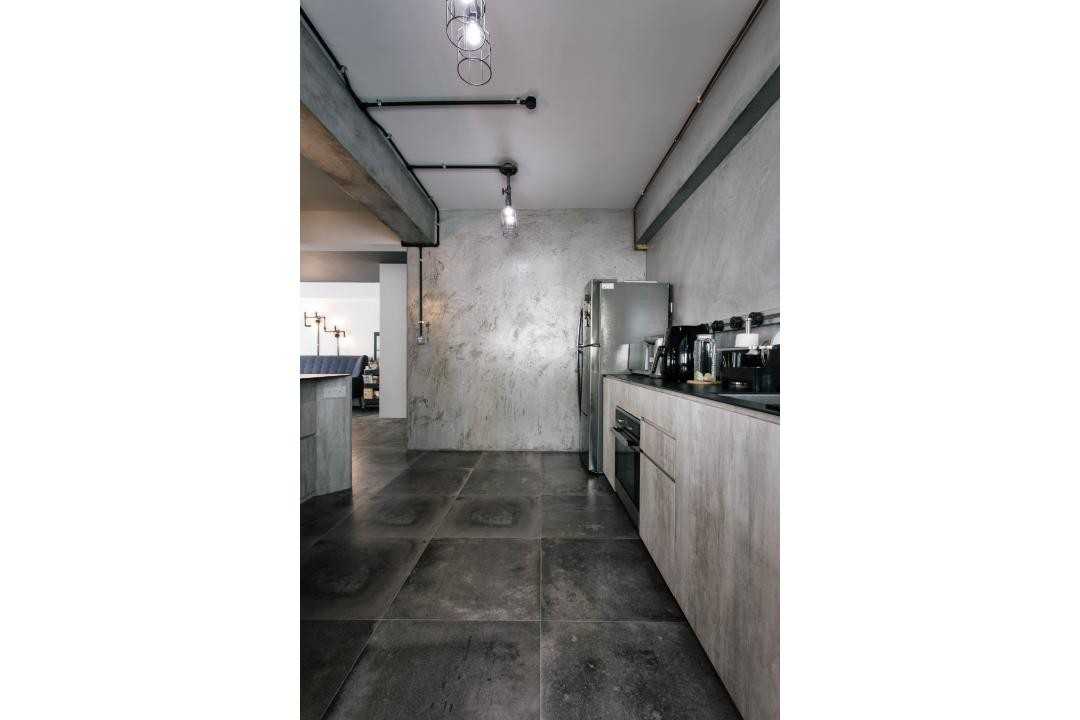 Industrial Kitchen with Cement Floor and Drop Light