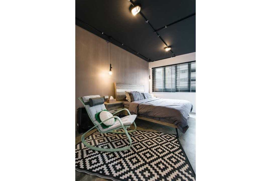 Industrial Bedroom with Armchairs and Queen Bed