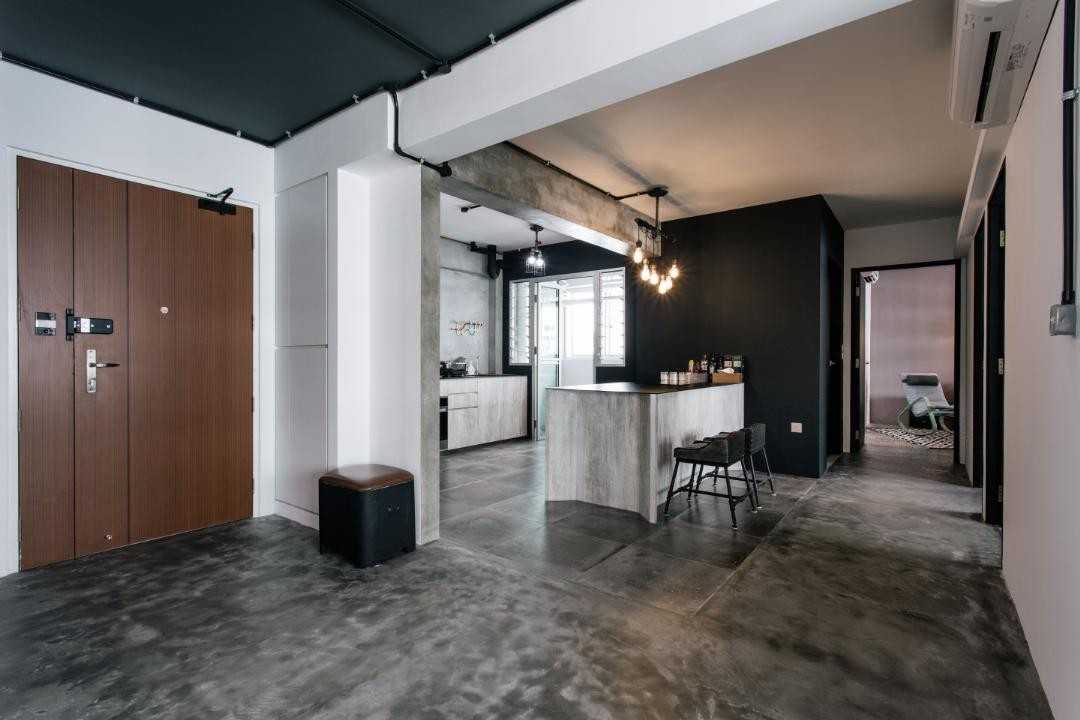 Industrial Entryway with Cement Floor and Stools