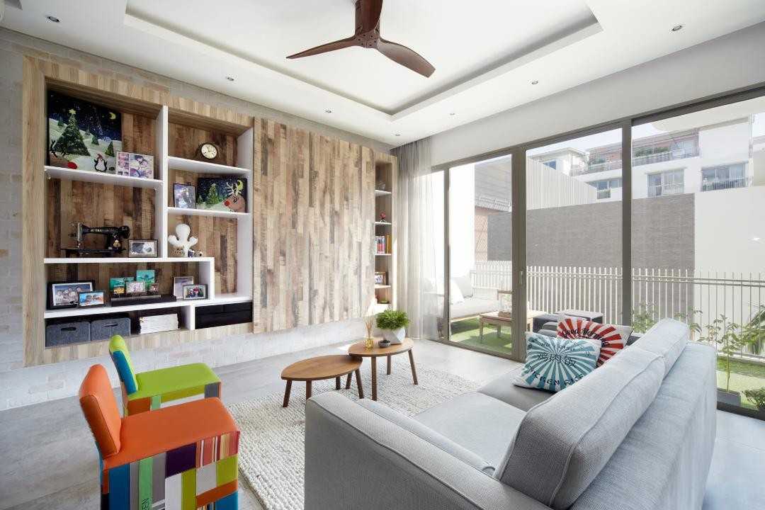 Eclectic Living Room with Feature Wall and Cove Lighting