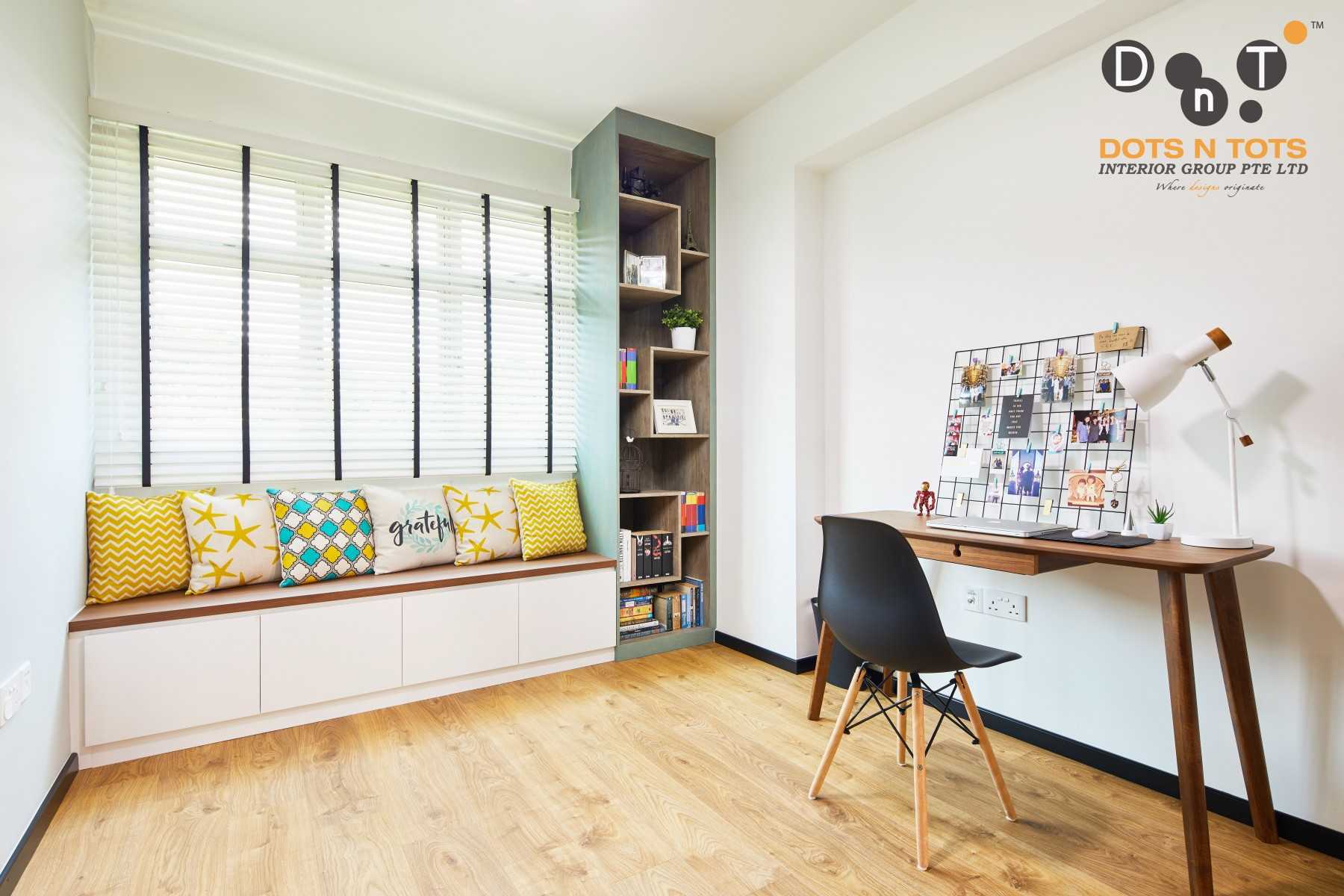 Modern Home Office with Bookshelf and Desk