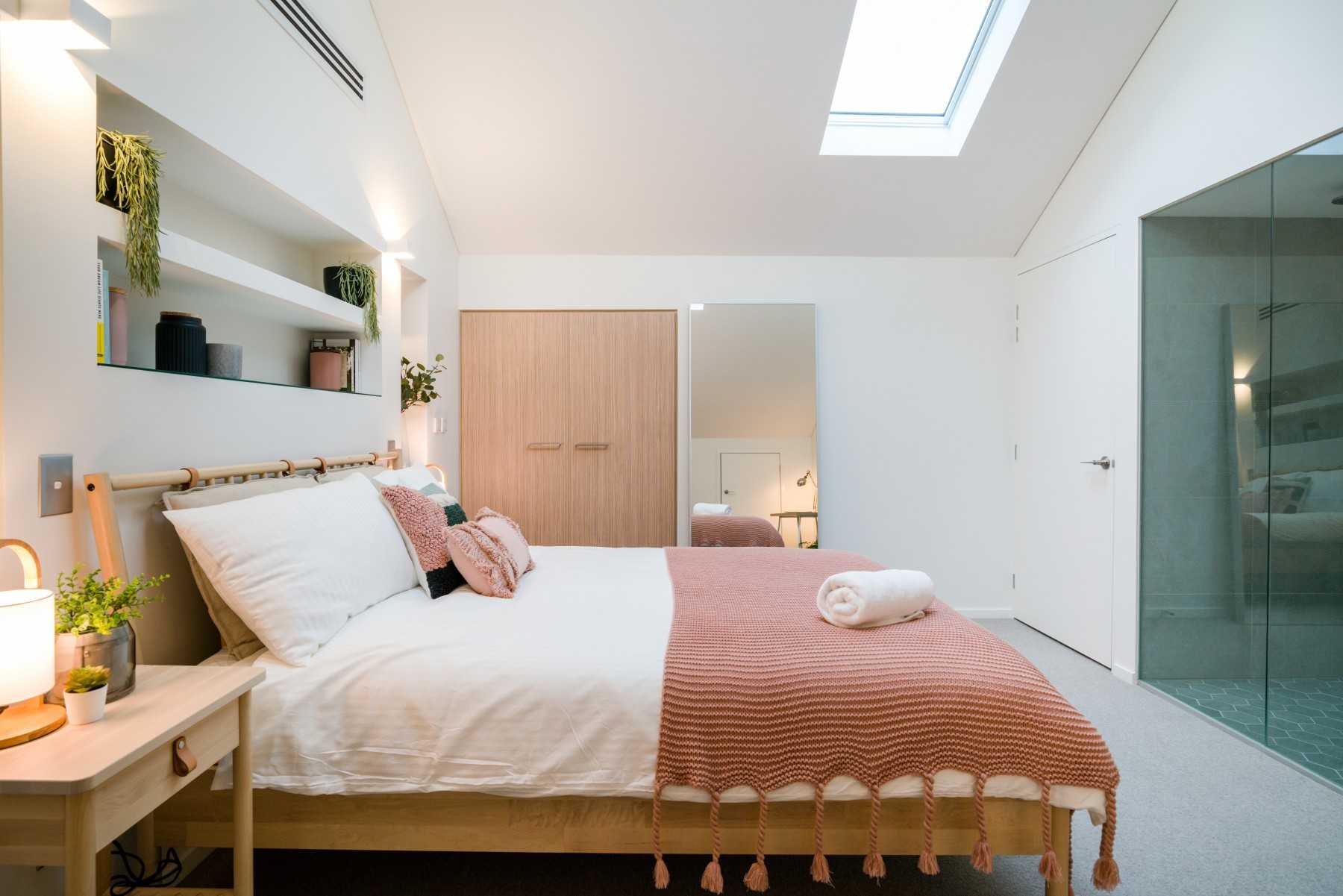 Eclectic Bedroom with Side Table and Queen Bed