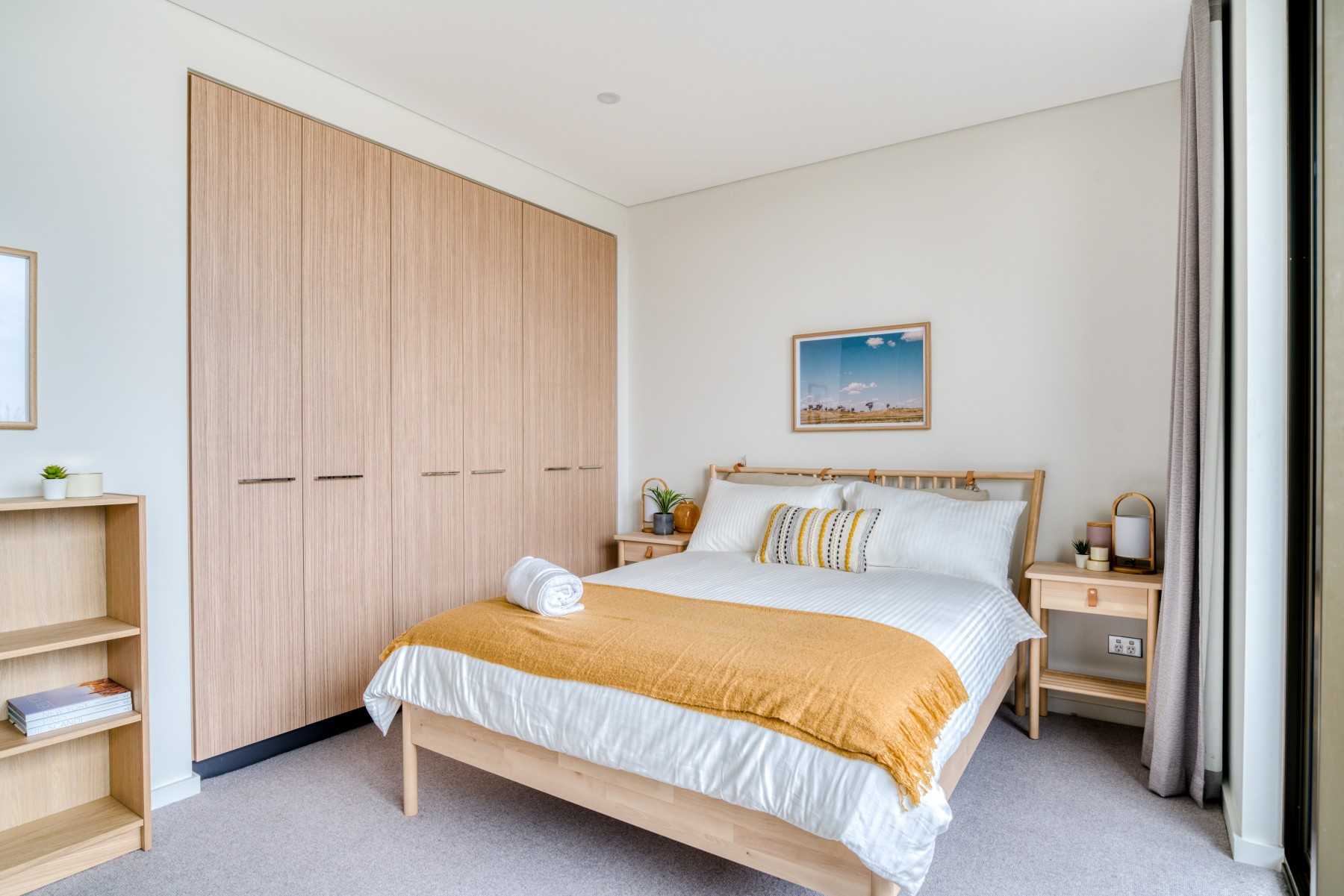 Eclectic Bedroom with Artwork and Wardrobe