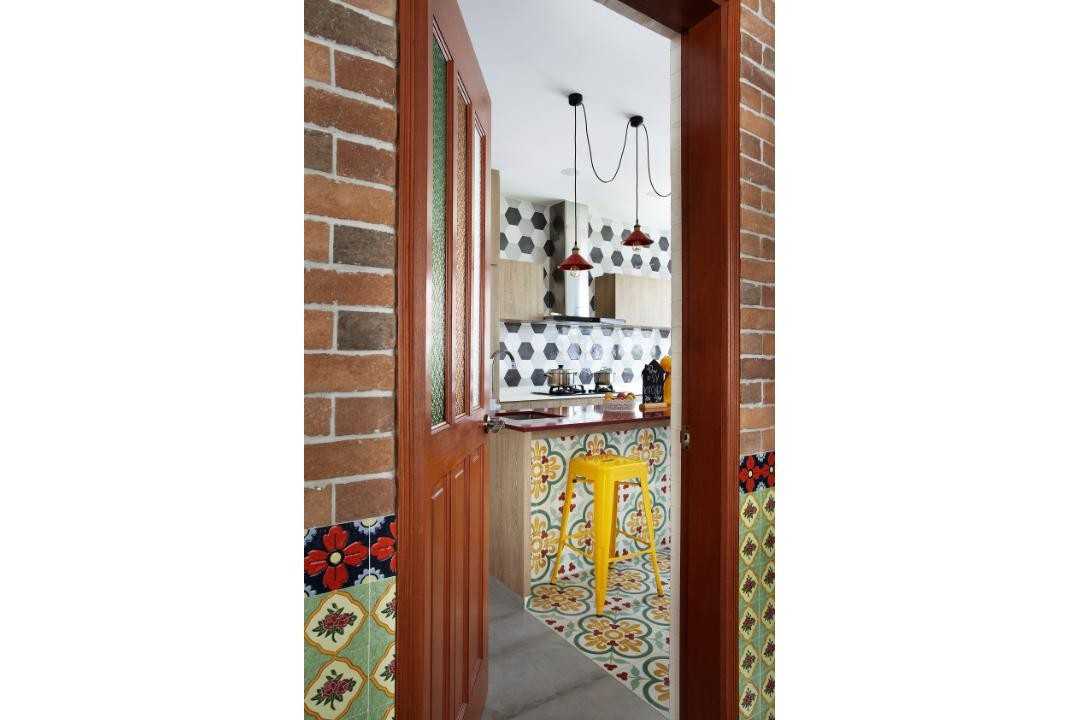 Eclectic Kitchen with Bar Counter and Doors
