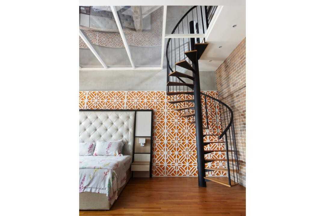 Eclectic Bedroom with Staircase and Queen Bed