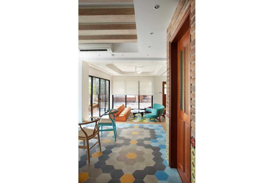 Eclectic Hallway with Rugs and Doors