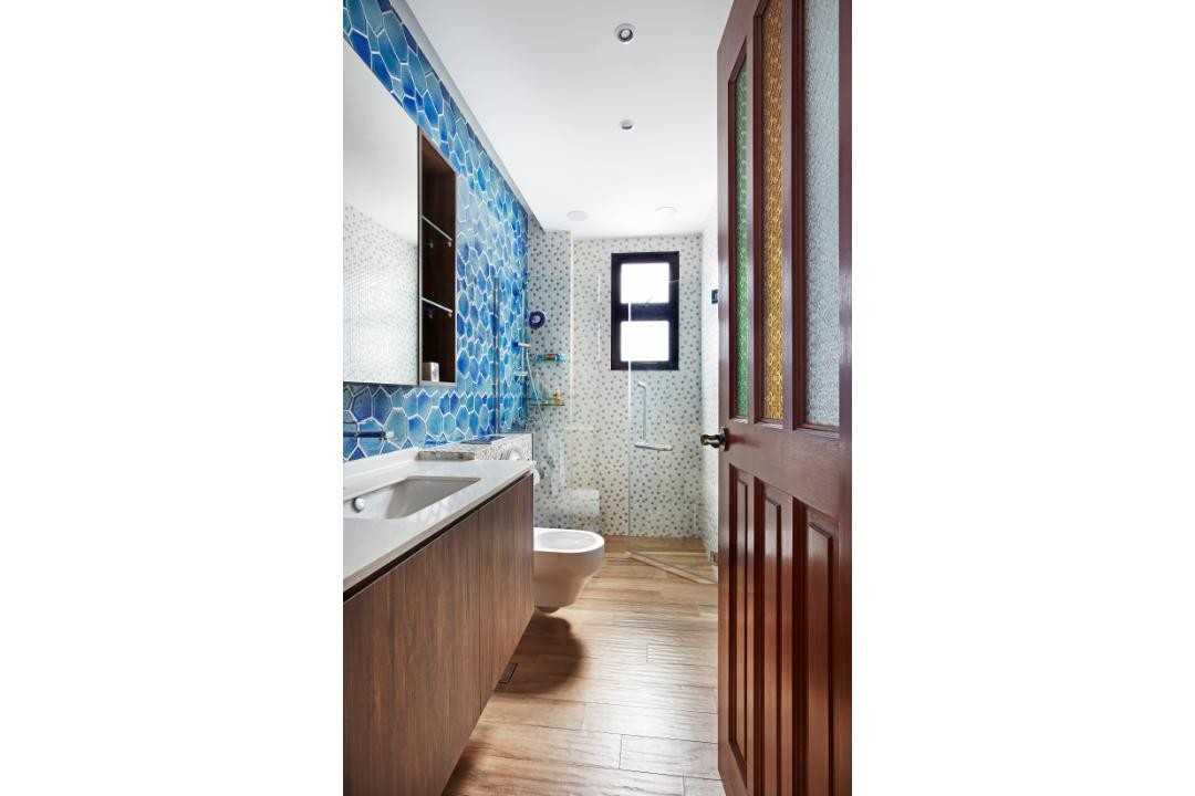 Eclectic Bathroom with Wood Flooring and Mirror