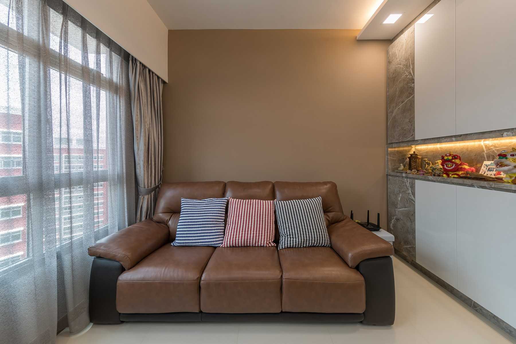 Asian Living Room with Bookshelf and Sofa