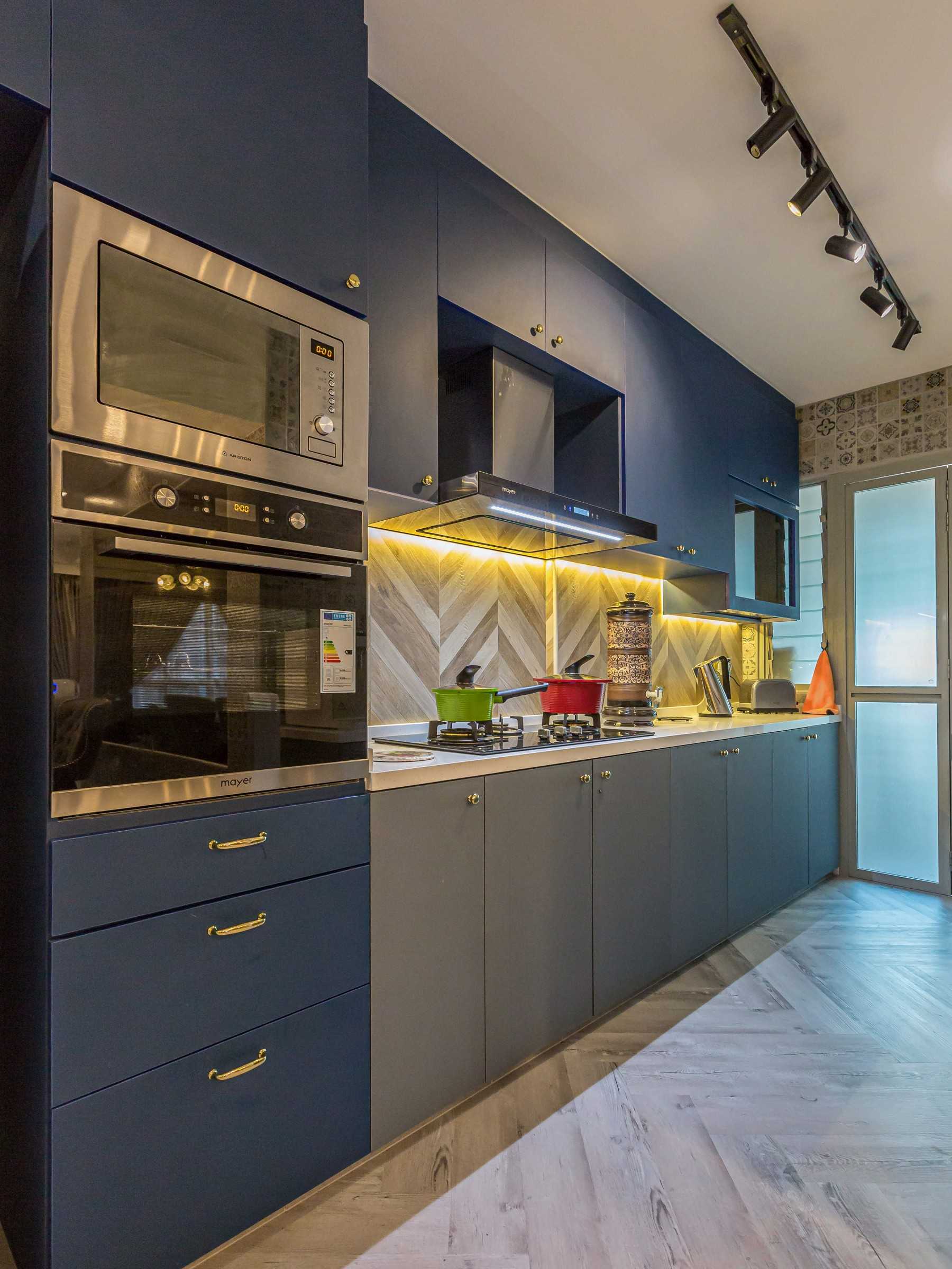 Eclectic Kitchen with Countertop and Herringbone Tiling