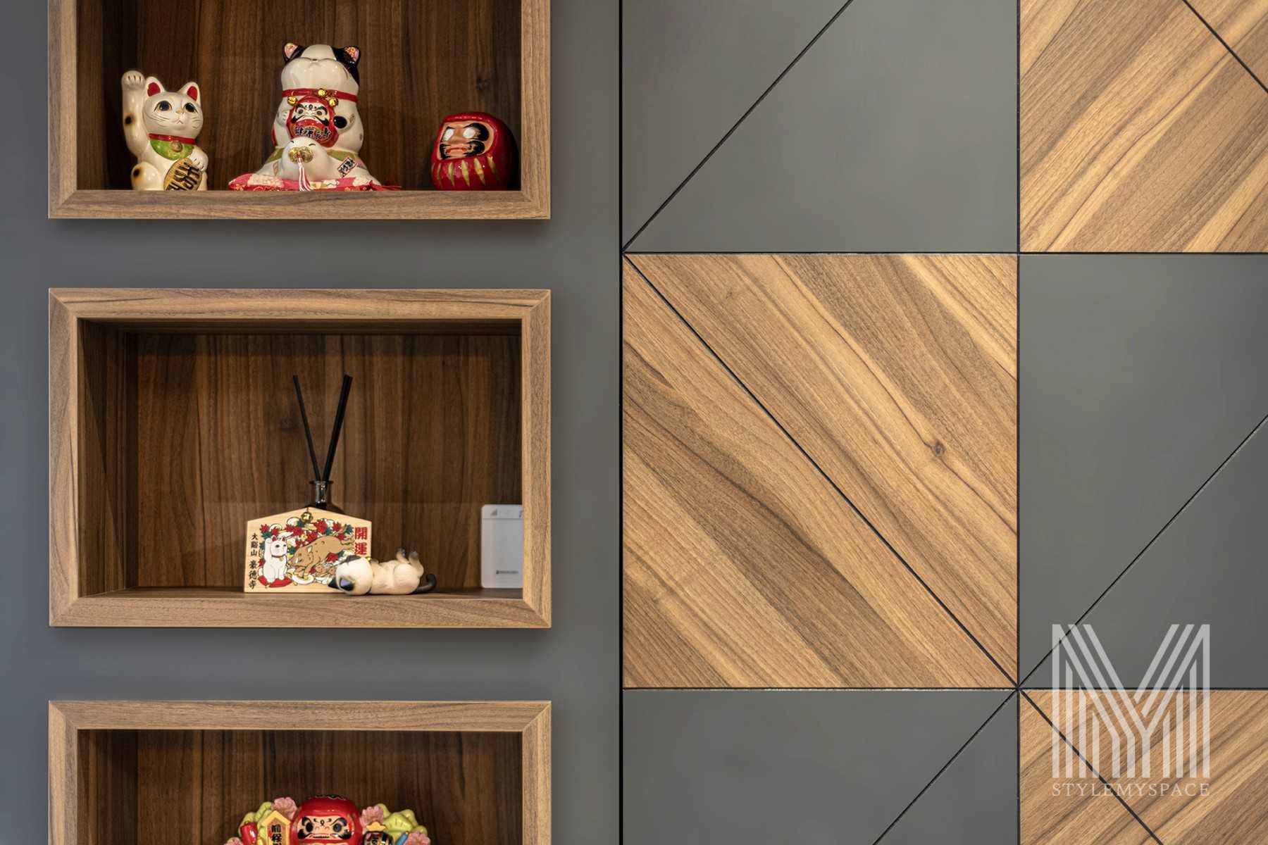 Modern Living Room with Bookshelf and Feature Wall