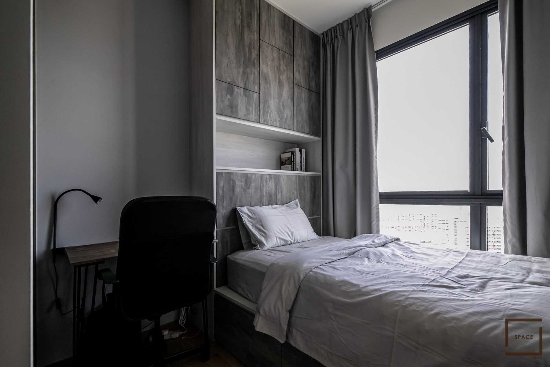 Minimalist Bedroom with Bookshelf and Sideboard