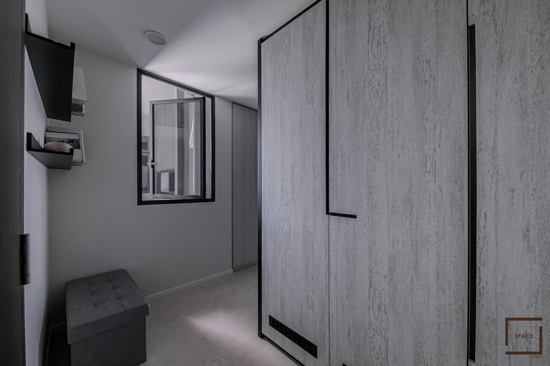 Minimalist Bedroom with Bookshelf and Bedroom Dresser