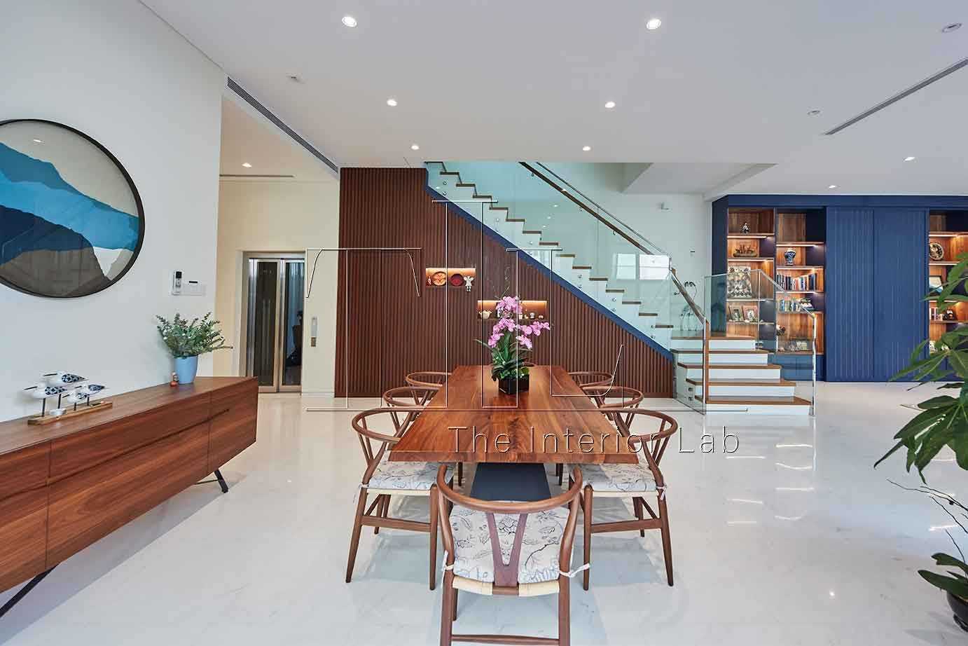 Modern Dining Room with Staircase and Drop Ceiling